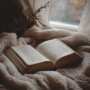 Cozy reading nook with an open book and soft lighting.