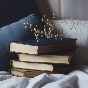 Stack of favorite books symbolizing comfort and renewal.